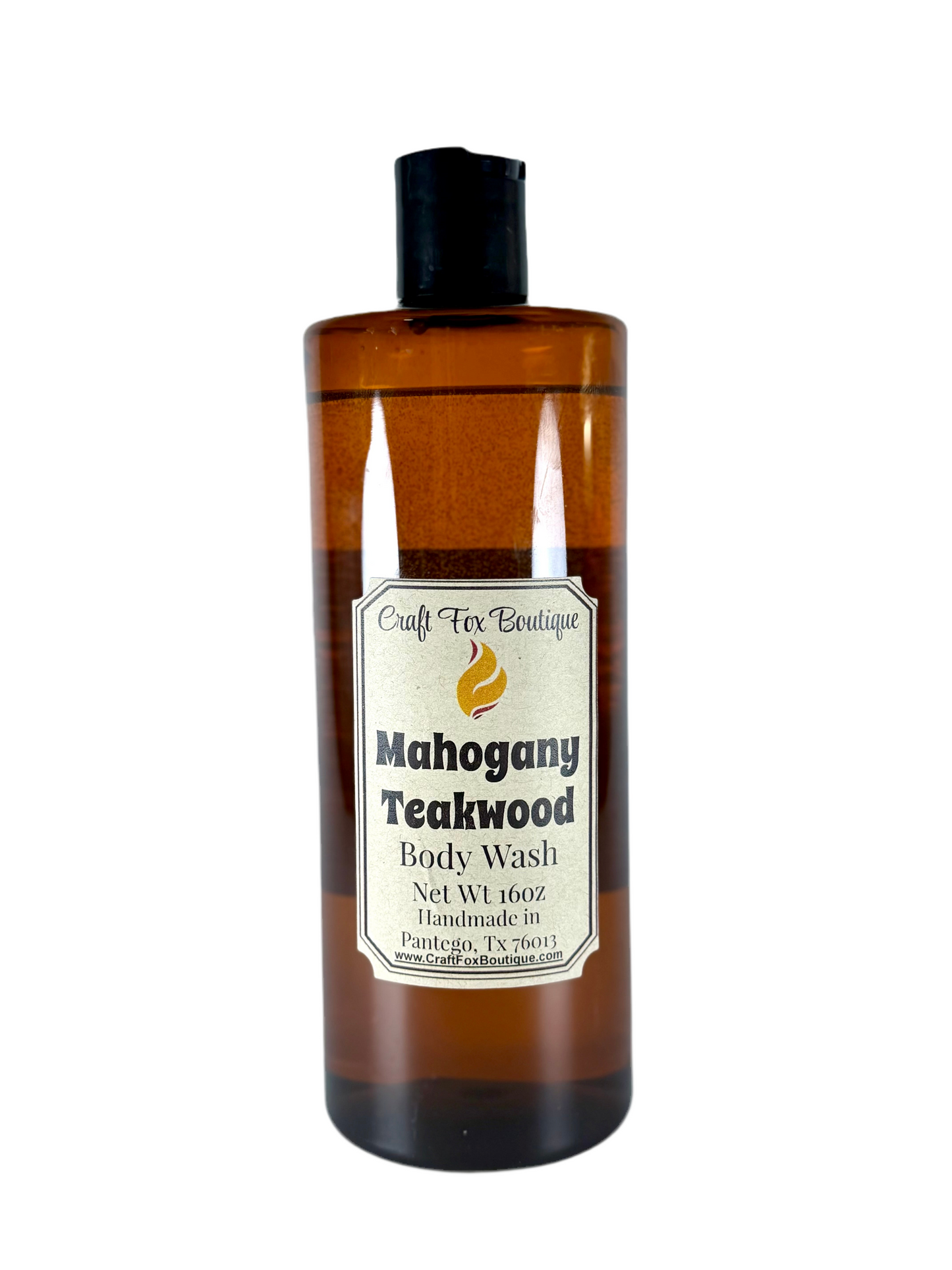 Craft Fox Boutique Mahogany Teakwood 16oz body wash bottle with black cap and label, showcasing the product's packaging and branding.