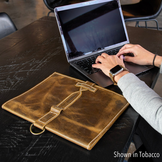 Large black journal cover by Rebekah Scott Designs with a smooth, matte finish and minimalistic style.