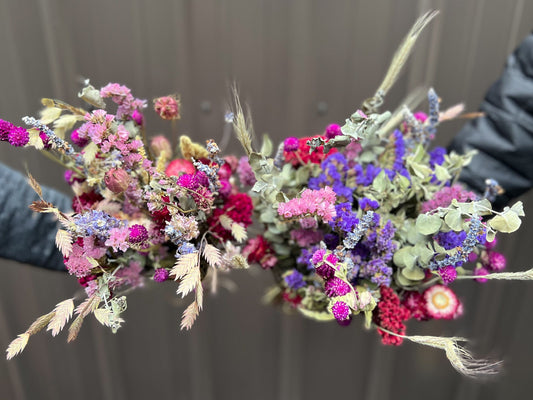 Dried bouquet with berry tones from SMFF Flowers by Sunny Meadows Flower Farm, featuring a mix of dried red and purple blooms.