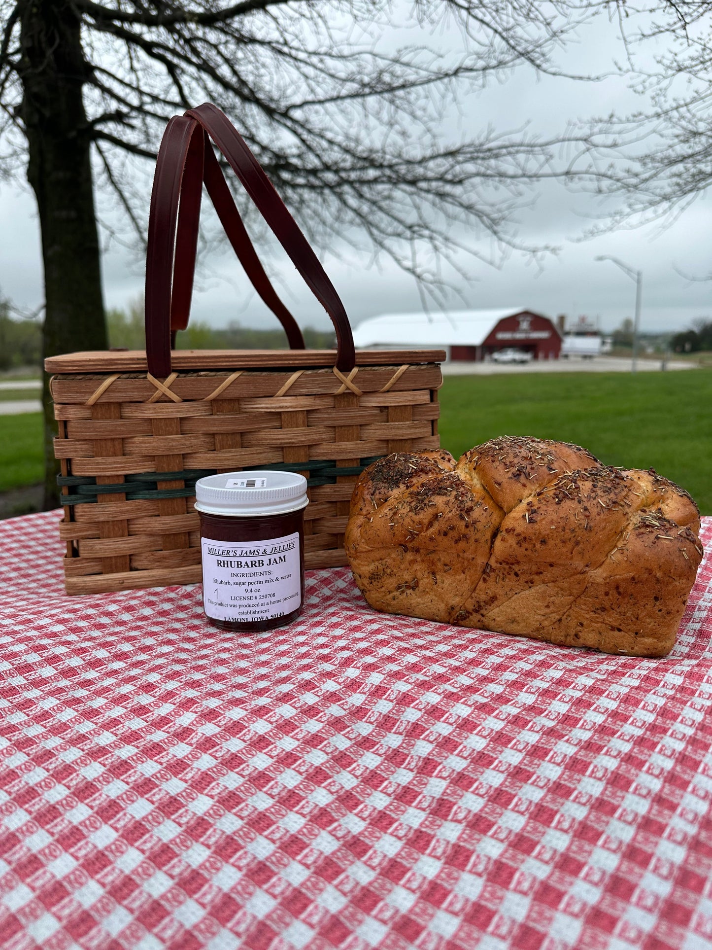 Jar of Miller's Amish Rhubarb Jam by Amish Country Store, featuring fresh, homemade rhubarb preserves in a glass jar.