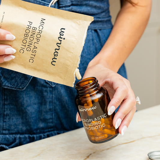 Winnow Daily Probiotic Starter Pack with capsules and packaging showing probiotic supplements for gut health.