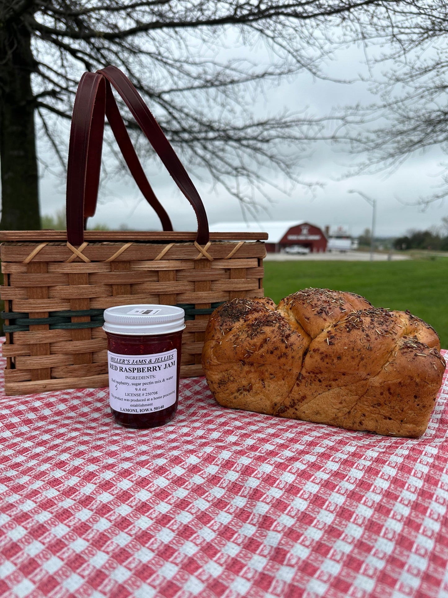 Amish Country Store Miller's Red Raspberry Jam jar with red raspberry jam and label, showcasing Amish-made Amish jam product.