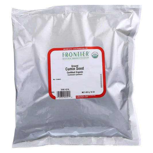 Organic cumin seed powder in a clear jar labeled Cozy Farm, showing the ground cumin used for cooking and seasoning.