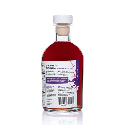 Back label of American Vinegar Works Wild Blueberry Apple Cider Vinegar bottle showing the product name and branding details.