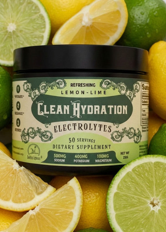 Glass of lemon lime flavored electrolyte drink from Clean Hydration by Roots and Leaves LLC, with fresh lemon and lime slices.