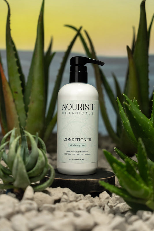 Rustic Strength Aloe Vera Conditioner bottle with green label, showing the natural skincare product for healthy hair.