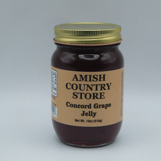 Canned Concord Grape Jelly 18 oz jar from Amish Country Store, showing the jar with purple grape jelly label and lid.