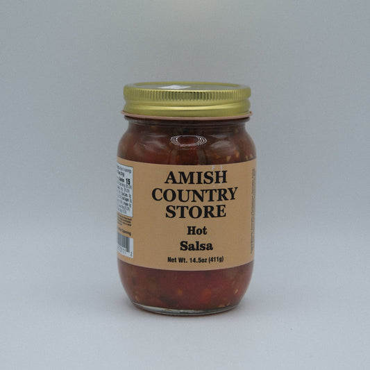 Canned Hot Salsa by Amish Country Store in a 14.5 oz jar, showing vibrant red salsa with visible herbs and spices.