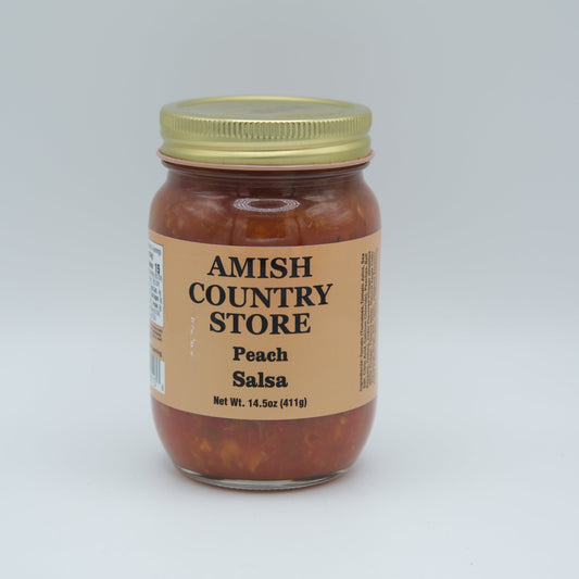 Canned Peach Salsa Mild in 14.5 oz jar from Amish Country Store, showing the label and fresh peach chunks inside.