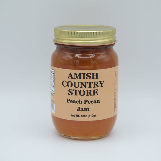 Amish Country Store peach pecan jam in an 18oz jar, showcasing the canned goods with peach and pecan ingredients visible.