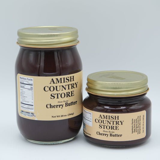 Canned Amish Country Store Cherry Butter in a 16 oz jar, showing smooth, vibrant cherry spread with a silver lid.
