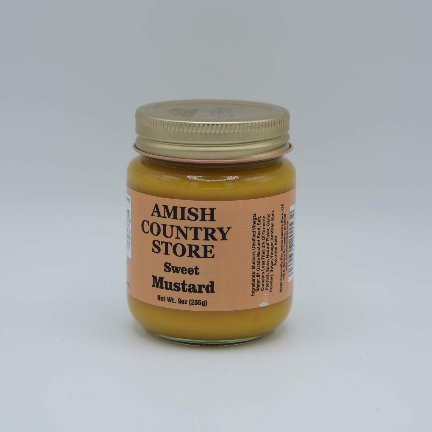 Amish Country Store sweet mustard in a 9oz glass jar, showing the jar with mustard and label on a white background.