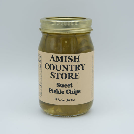 Canned sweet pickle chips in a 16 oz jar from Amish Country Store, showing glossy, sliced sweet pickles ready for use.