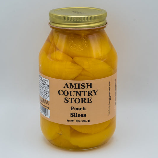 Canned peach slices in a 32oz jar from Amish Country Store, showing golden peach slices in syrup in a clear container.