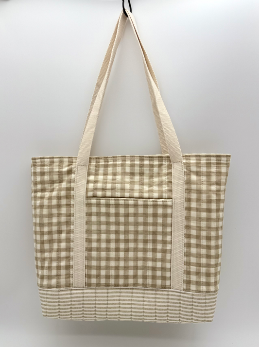 Handmade Gingham tote bag by C2 Creations LLC, taupe and cream with quilted bottom and striped detail, back view.