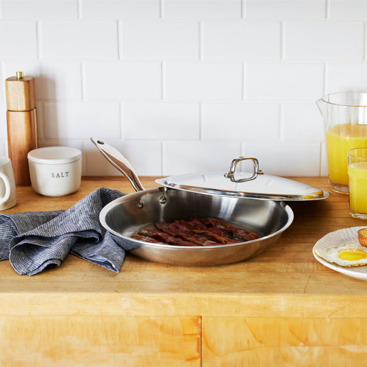Heritage Steel Titanium Series 12-inch fry pan with lid, durable cookware for versatile stovetop cooking.