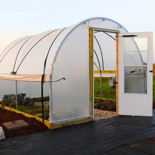 Bootstrap Farmer hobby greenhouse kit with hoop structure and batton strapping, ideal for small-scale gardening and plant protection.