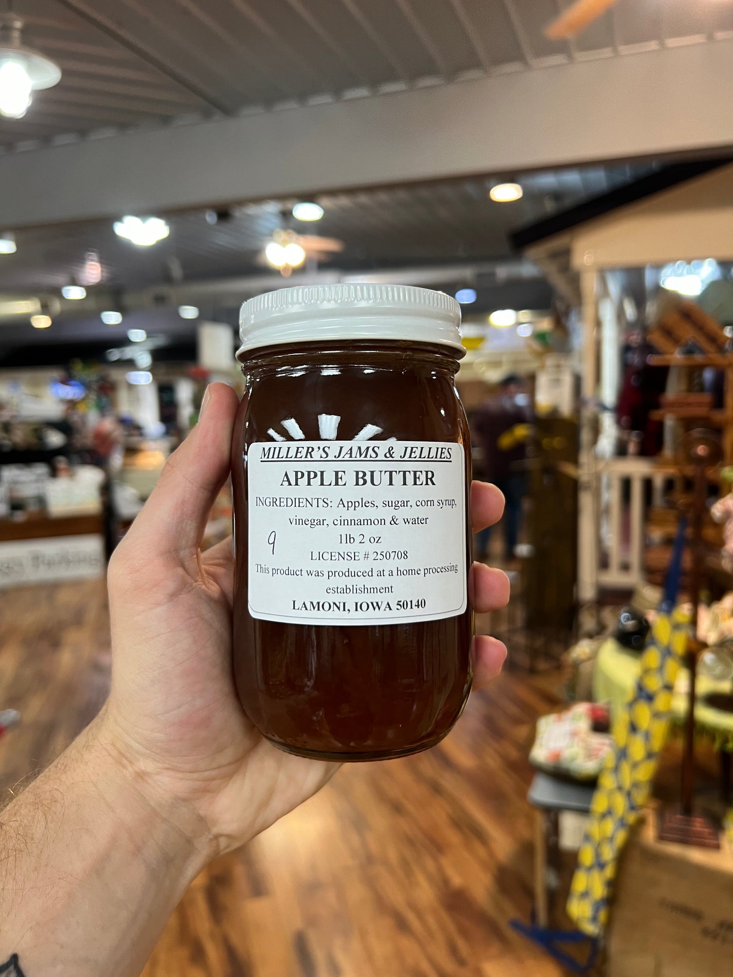 Amish Country Store Miller's Apple Butter in a jar, showcasing its smooth, rich apple spread made by Amish artisans.