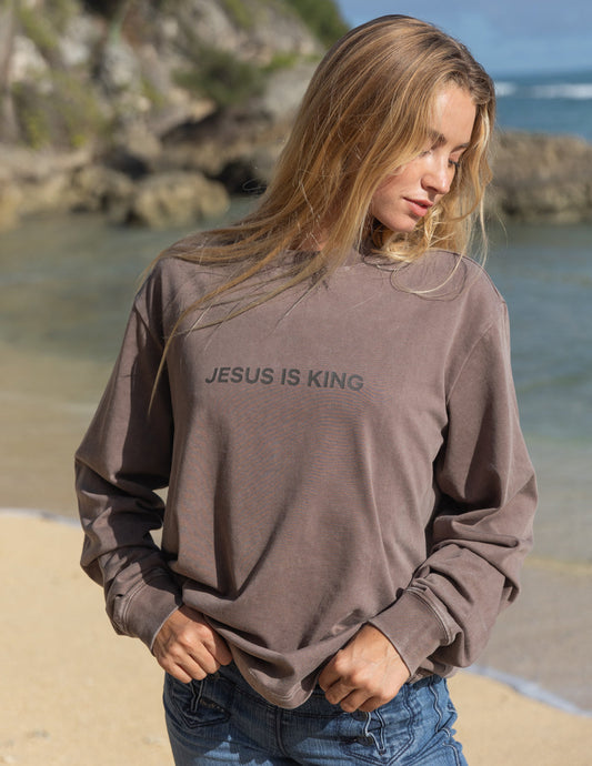 Unisex brown Jesus Is King long-sleeve T-shirt by Elevated Faith featuring a religious graphic design on the front.