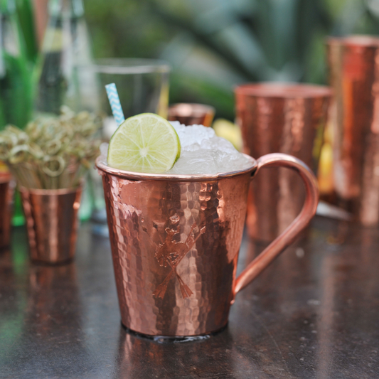 Solid copper mule mug with a copper handle, 18 oz capacity, by Sertodo, featuring a Mexican mule design on the mug.