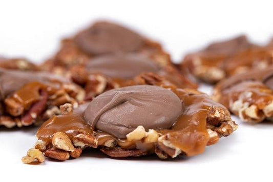 Millican Pecan Milk Chocolate Caramillicans with pecan filling, individually wrapped pecan treats covered in smooth milk chocolate.