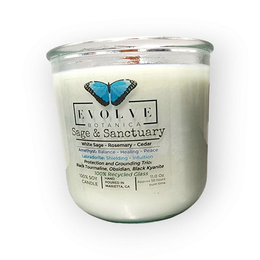 Rocks Candle by Evolve Botanica with black kyanite, tourmaline, obsidian, amethyst, and labradorite in a black container.
