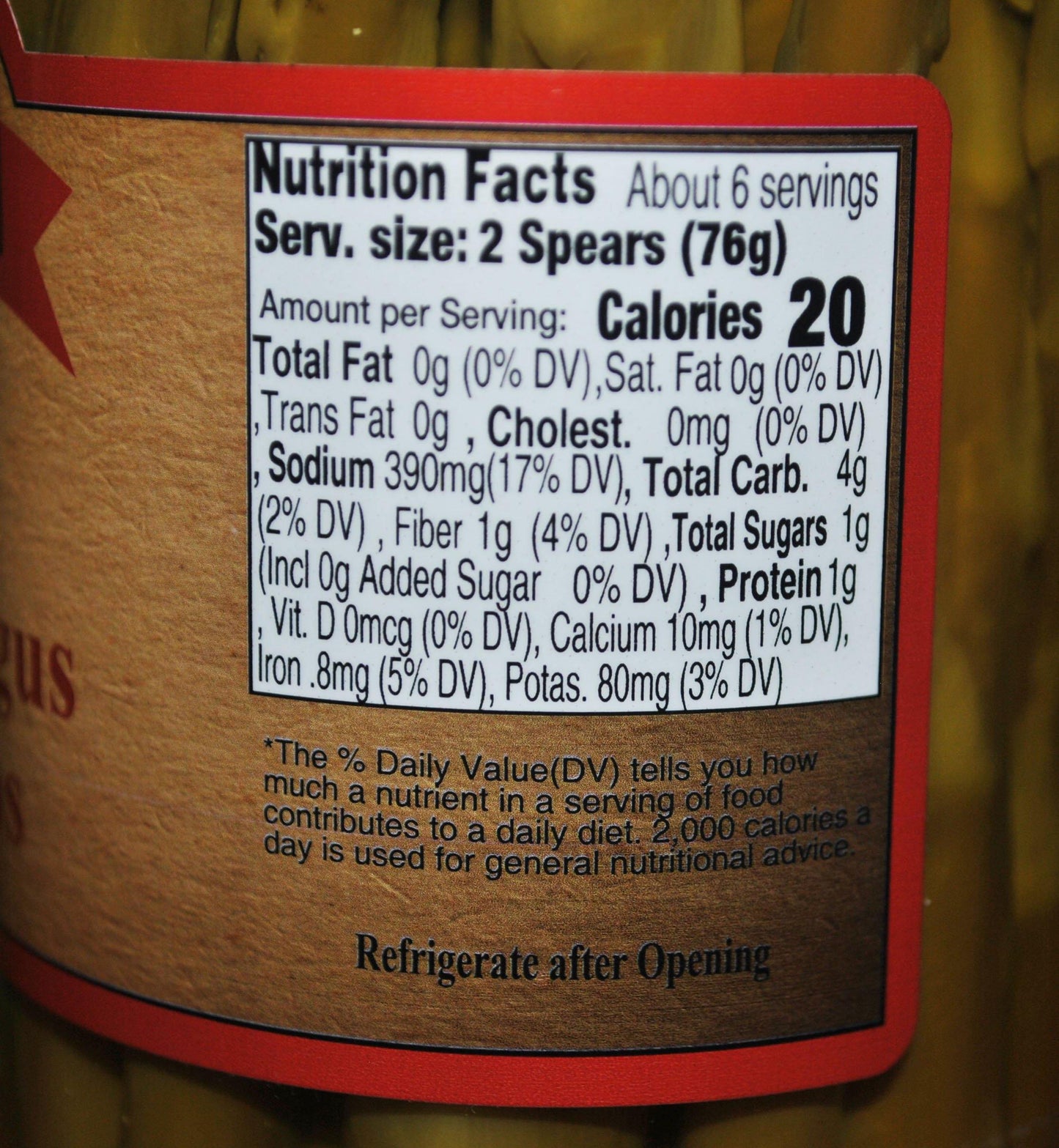 Canned pickled asparagus with jalapenos in a 16oz jar, Amish Country Store brand, showing vibrant green asparagus and jalapenos.