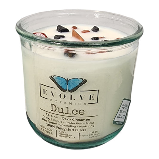 Evolve Botanica Dulce Rocks Candle with red jasper and onyx gemstones, soy wax, wood wick, and rustic candle holder.
