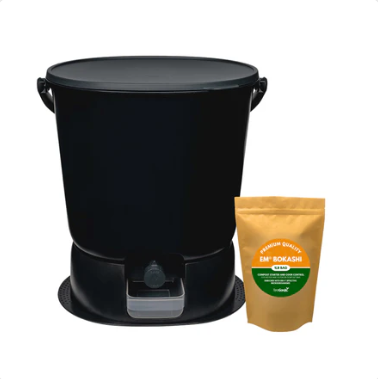 The Essential Bokashi Compost Bin Starter Kit, 4.4 gal by Teraganix Wholesale includes a black bin with lid and spigot, plus a brown bag of EM® bokashi compost starter—everything you need for easy indoor composting.