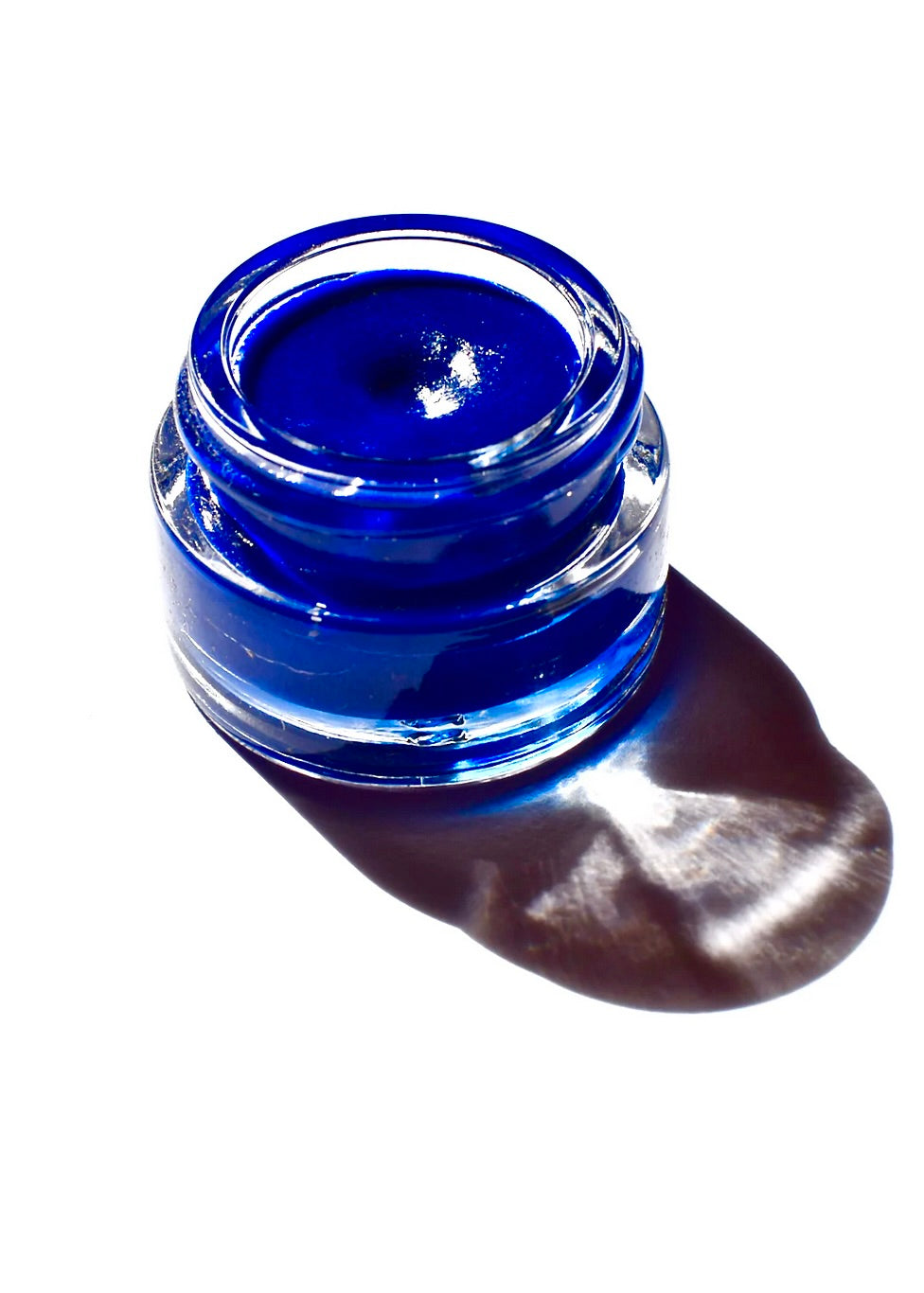 SEA Lip Balm from plant makeup, a body makeup product, shown in a close-up image highlighting the balm's texture and packaging.