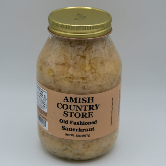 Canned Amish Country Store Old Fashioned Sauerkraut 32oz jar with white label and metal lid, showcasing traditional fermented cabbage.
