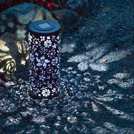 Allsop Home & Garden Bloom punched metal solar lantern in midnight blue with intricate cutout design for outdoor lighting.