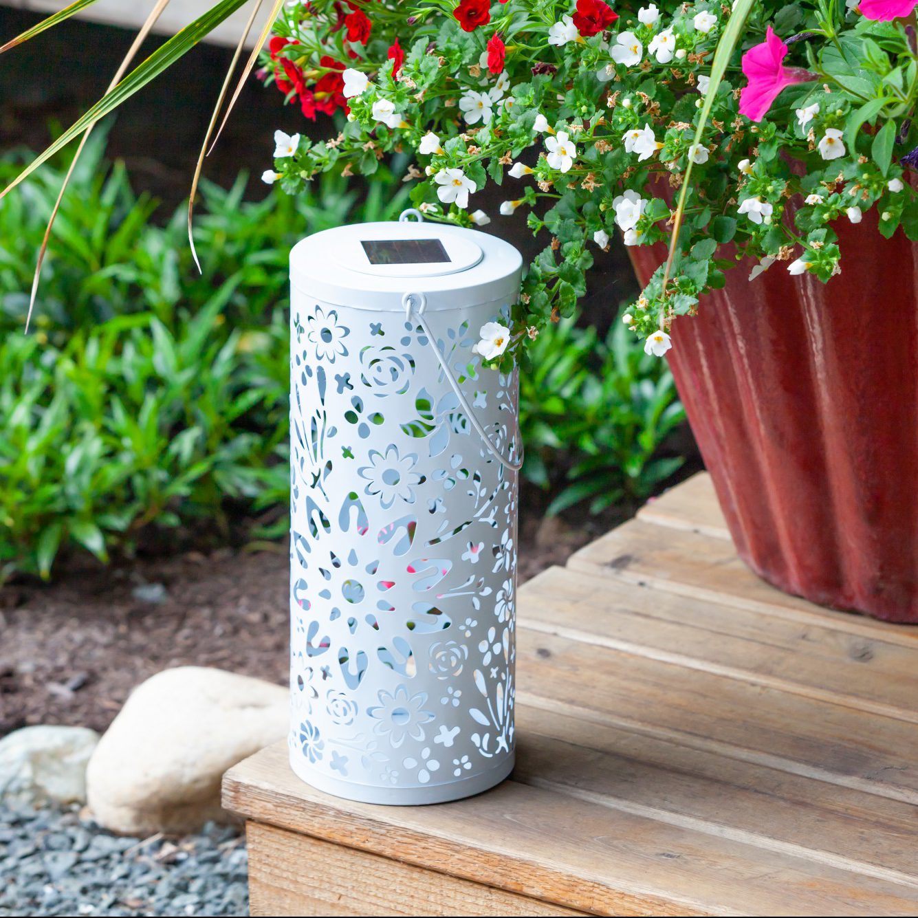 White Bloom Punched Metal Solar Lantern by Allsop Home & Garden showing intricate punched metal design and solar panel top.