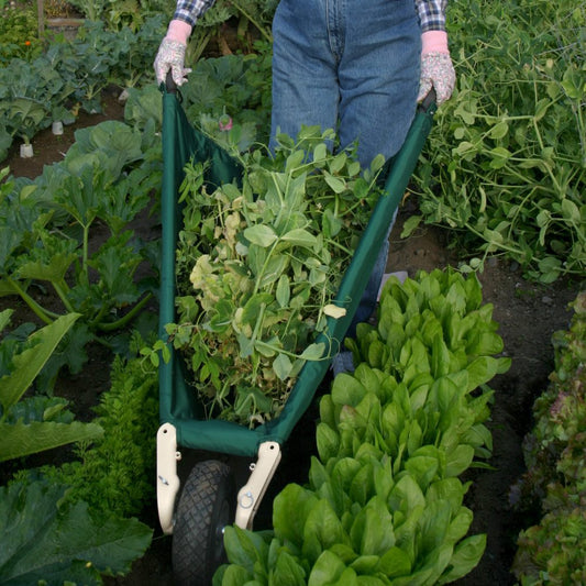 Allsop Home & Garden WheelEasy LE foldable garden cart wheelbarrow with sturdy handles and a large load capacity for gardening tasks.