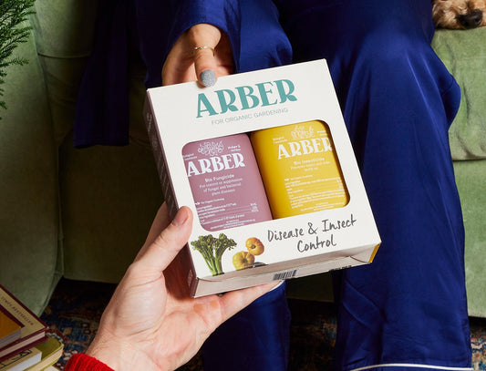 Arber Organic Disease and Insect Control Starter Kit with bottles of organic pest and disease control solutions on a white background.