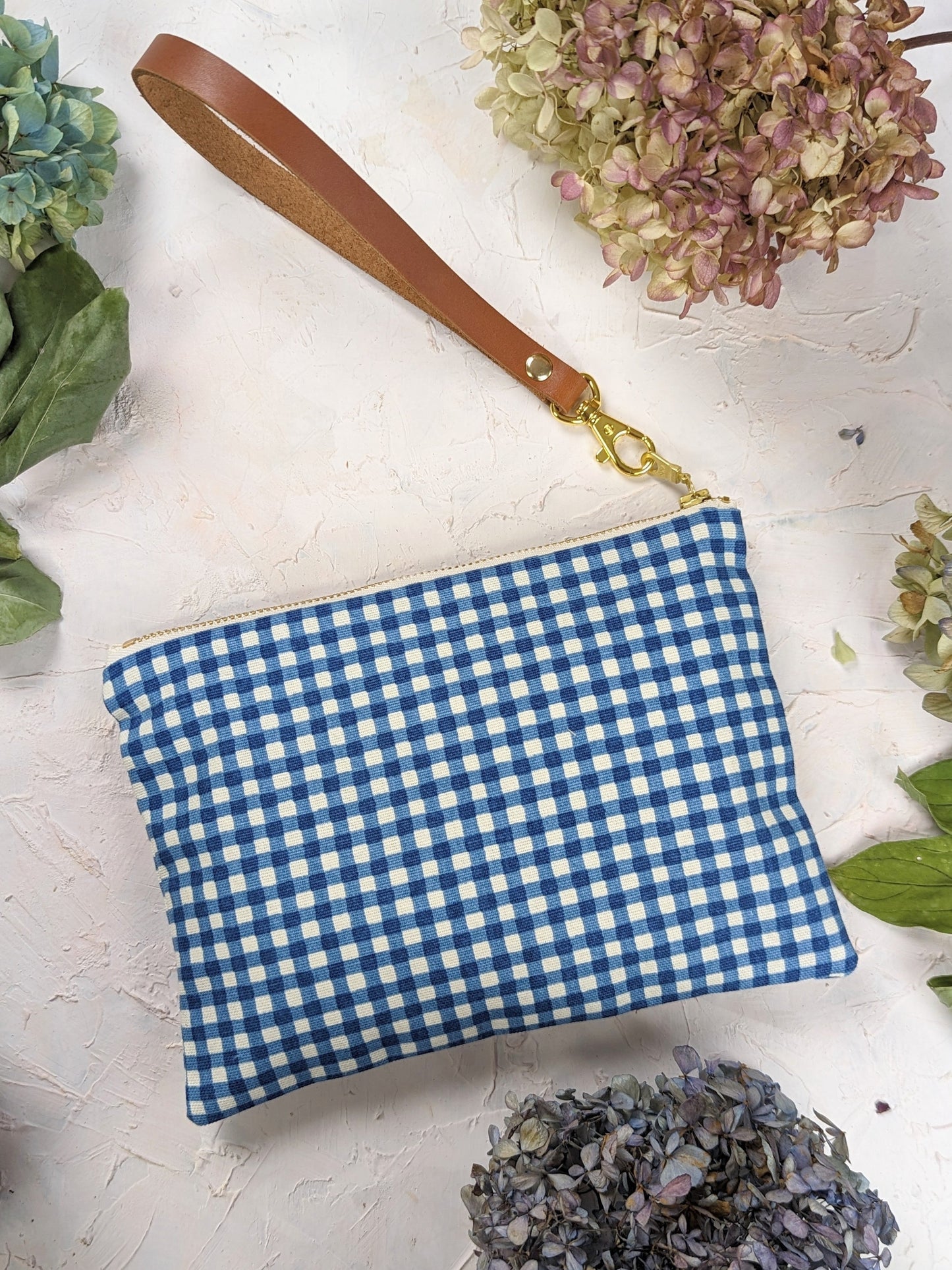 Magenta Summer Picnic Wristlet Purse by Ash & Rose showing a compact, stylish accessory with a wrist strap perfect for outdoor outings.