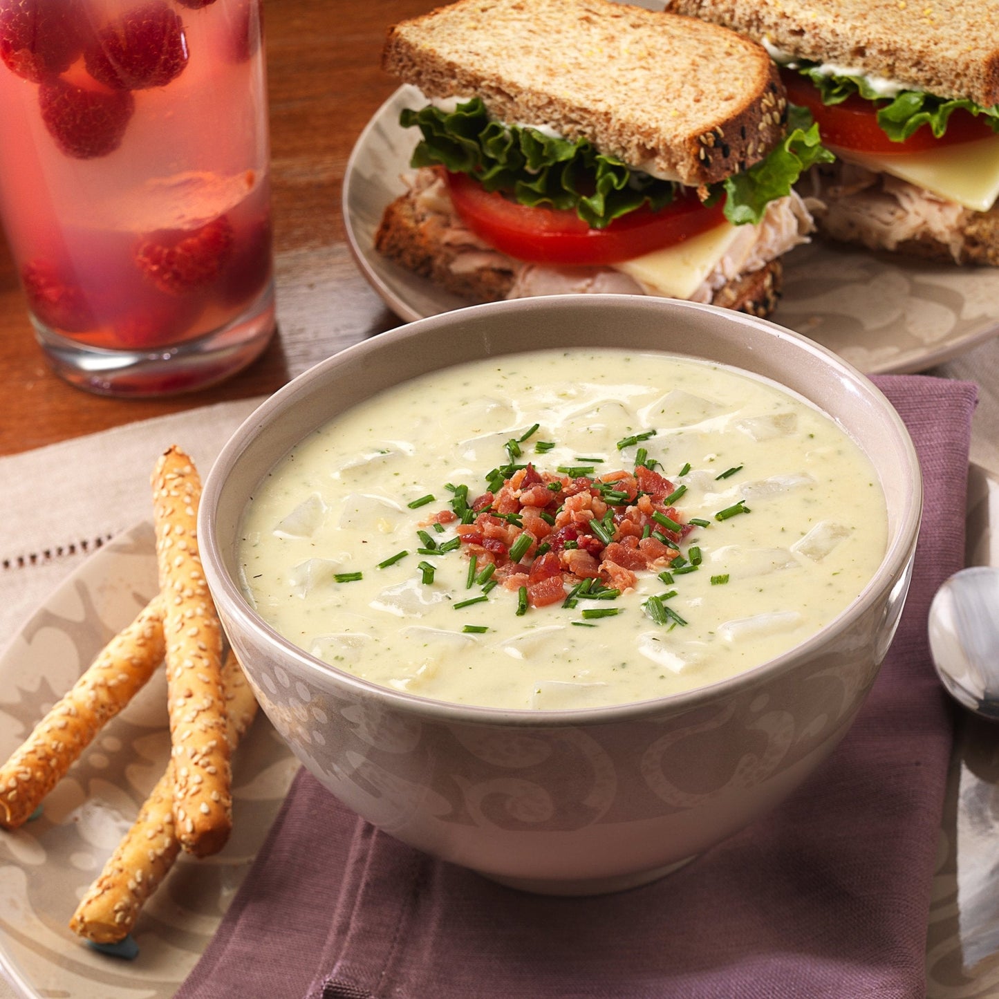 Canned Augason Farms creamy potato soup mix can with 36 servings, showing the label and can lid.