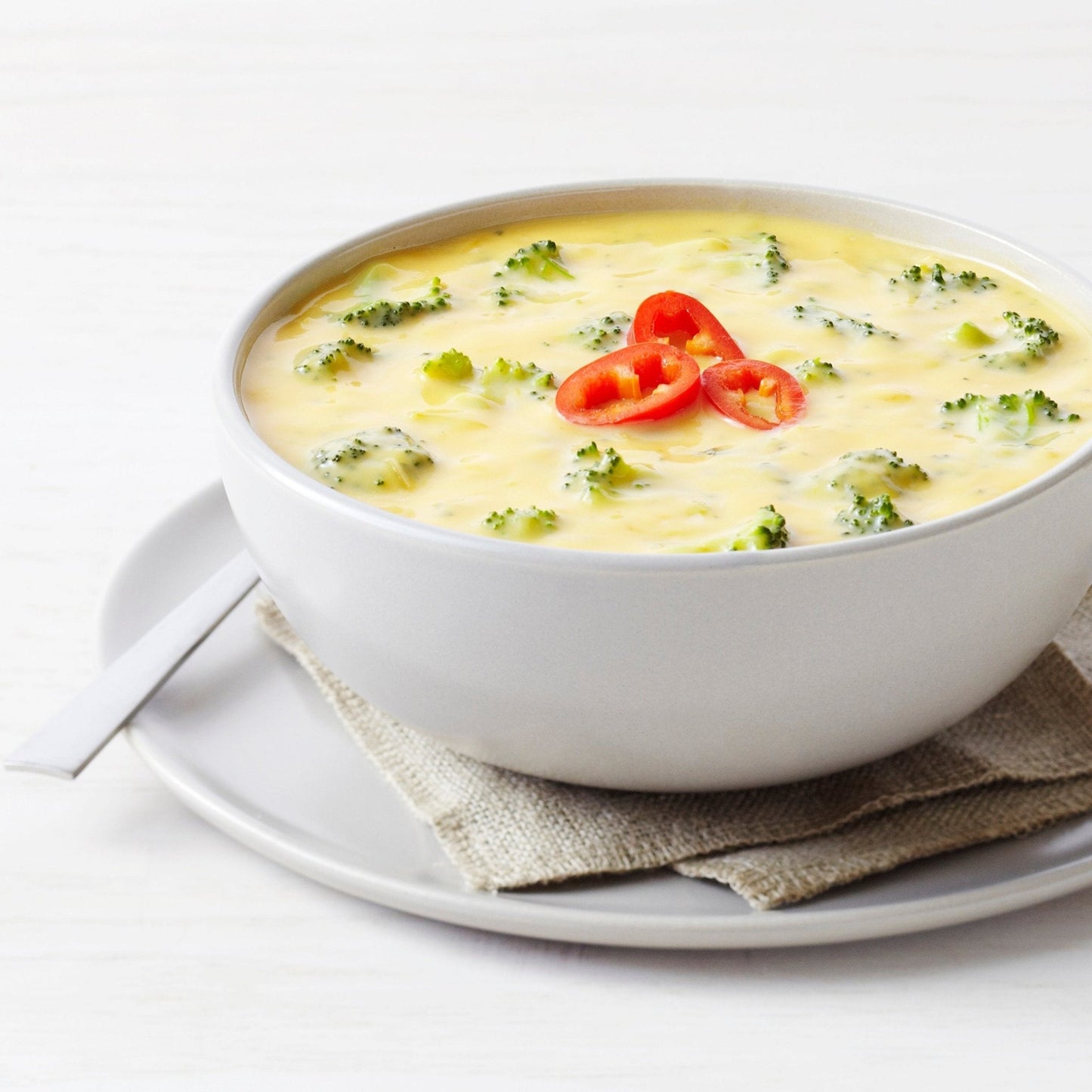 Can of Augason Farms Cheesy Broccoli Soup Mix with 38 servings, showing the product label and can packaging.