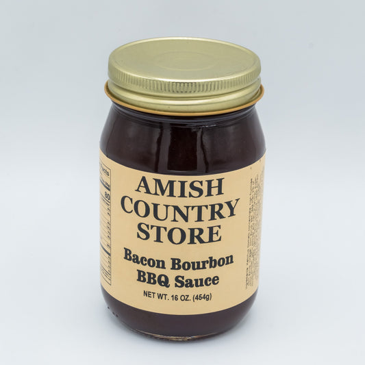 Canned Amish Country Store Bacon Bourbon BBQ Sauce 16 oz jar with label showing bacon, bourbon, and smoky barbecue flavor.