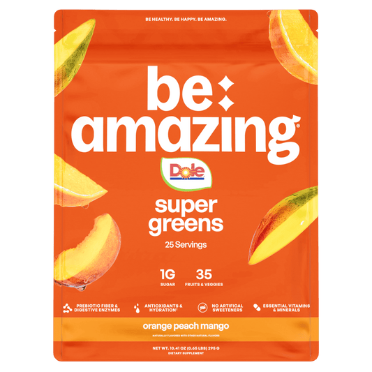 Be Amazing Super Greens supplement with Dole Whip Pineapple flavor, featuring vibrant greens and pineapple flavor packaging.