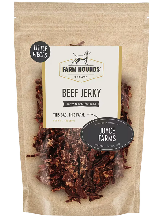 Farm Hounds beef jerky pieces shown in front, highlighting their small, savory beef jerky slices with a natural appearance.