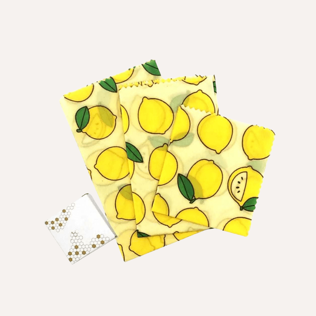 Reusable beeswax food wraps by Tilley + Me, organic and sustainable for eco-friendly food storage, shown in various sizes.