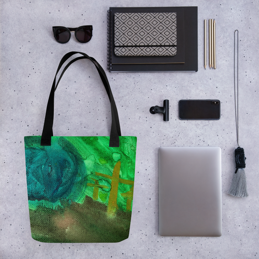 Abstract tote bag featuring vibrant green and teal hues a golden fence and textured brushstrokes showcasing an artist's impression of a landscape