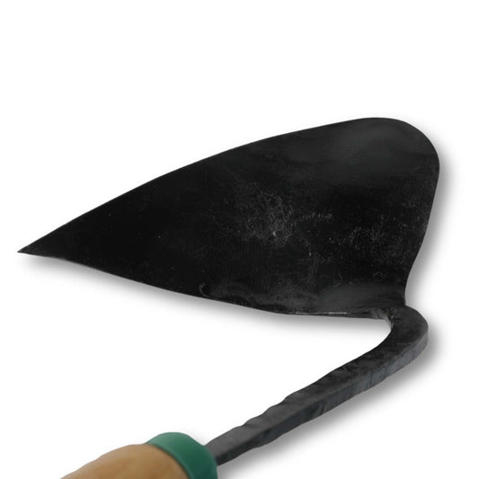 Ez-Digger Korean Triangle Blade with short handle by Bootstrap Farmer, shown in use on soil for digging and trenching.