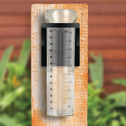 Luster Leaf Rapitest Rain Gauge with bracket by Bootstrap Farmer, clear rain measurement device mounted on a support bracket.