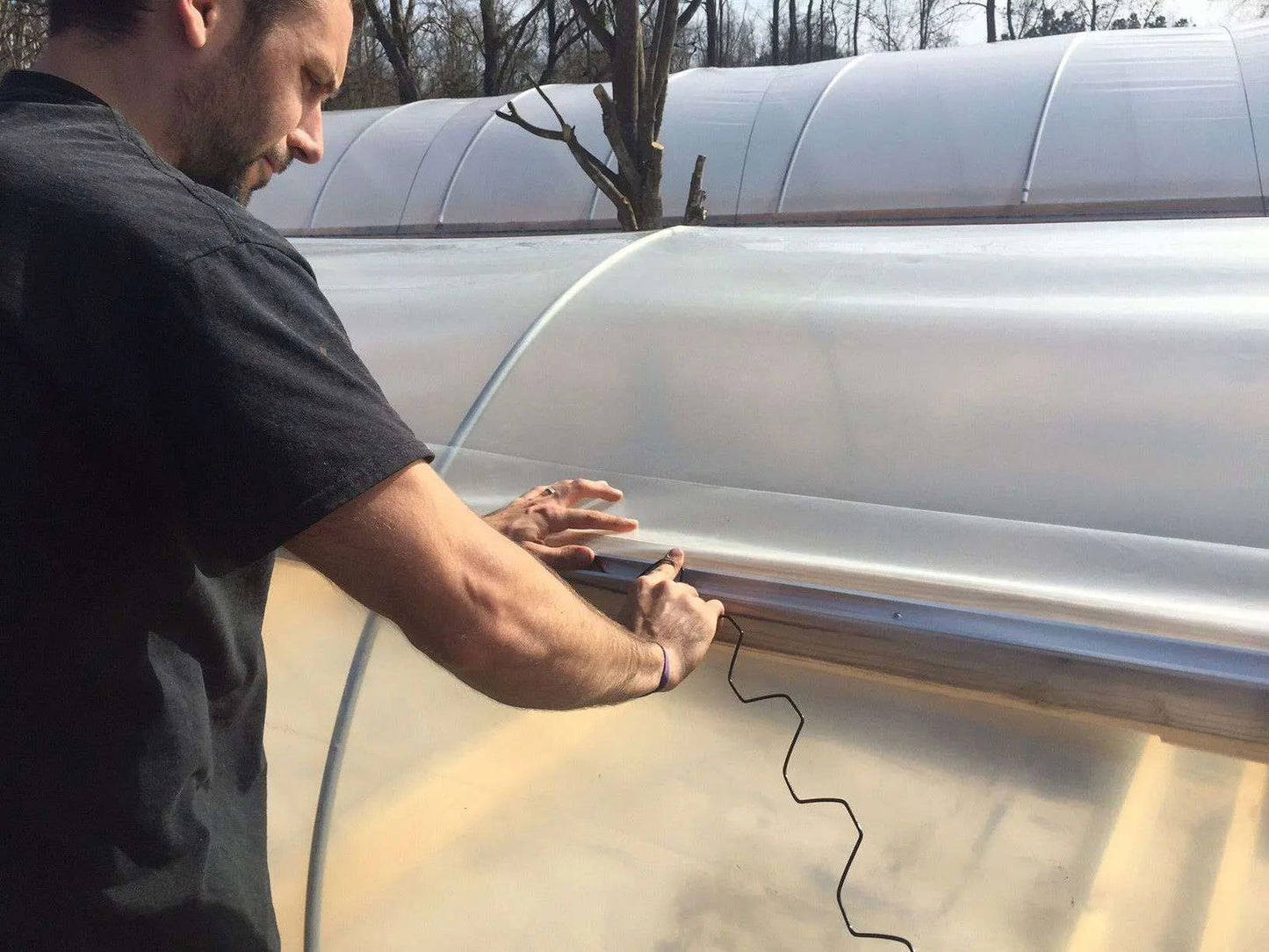 Bootstrap Farmer greenhouse PVC-coated spring wire lock for greenhouse parts, durable and flexible for secure plant support.