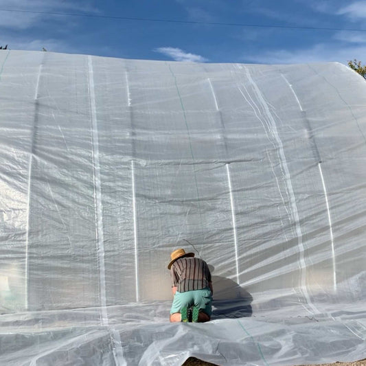 Bootstrap Farmer greenhouse woven plastic, 8 mil Solarig 156, green, durable plastic covering for greenhouse protection.