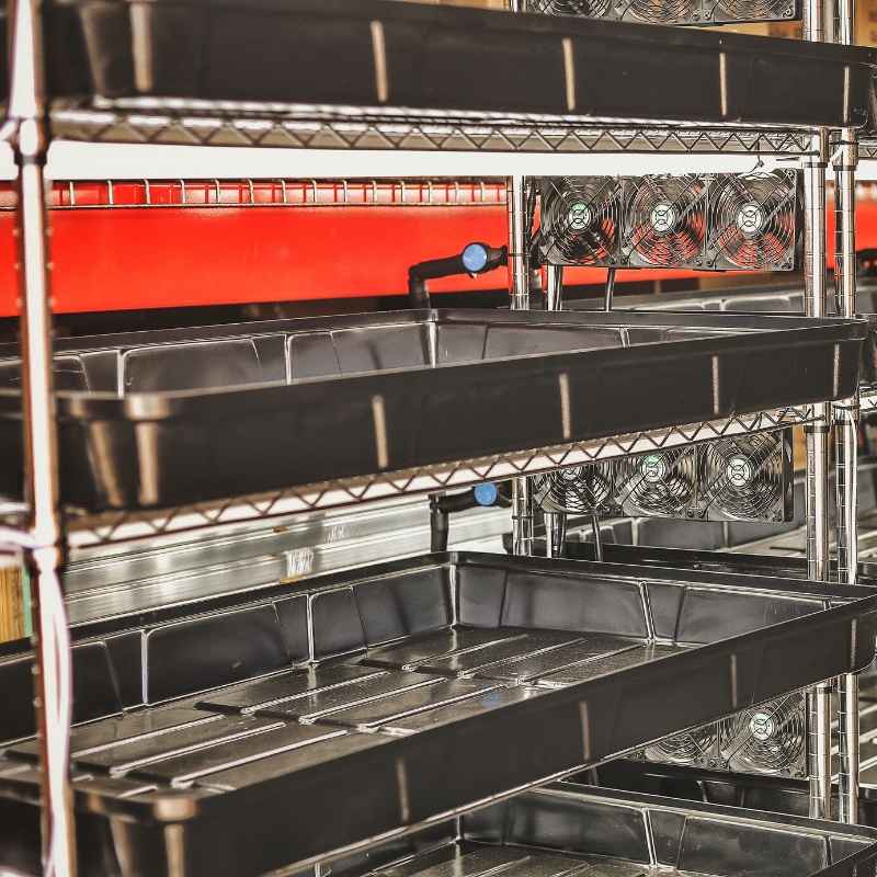 Hydroponic Grow Rack by Bootstrap Farmer, 3-tier automated vertical propagation rack for efficient plant propagation.