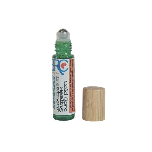 By Robin Creations cold sore treatment roll-on in a small bottle, designed for cold care and soothing cold sores.