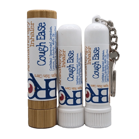 By Robin Creations Cough Ease Aromatherapy Inhaler attached to a keychain, designed for massage and relaxation.